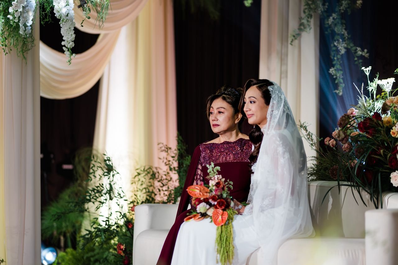 Mother and Daughter Emotional Dais Connection