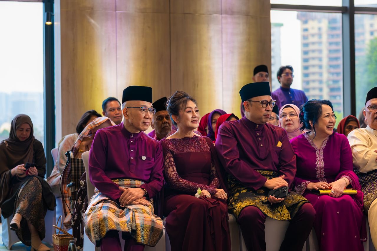 VIP Parents and Elders in Royal Purple Songket