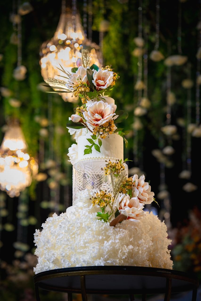 Luxury Multi-Tier Floral Wedding Cake under Chandeliers