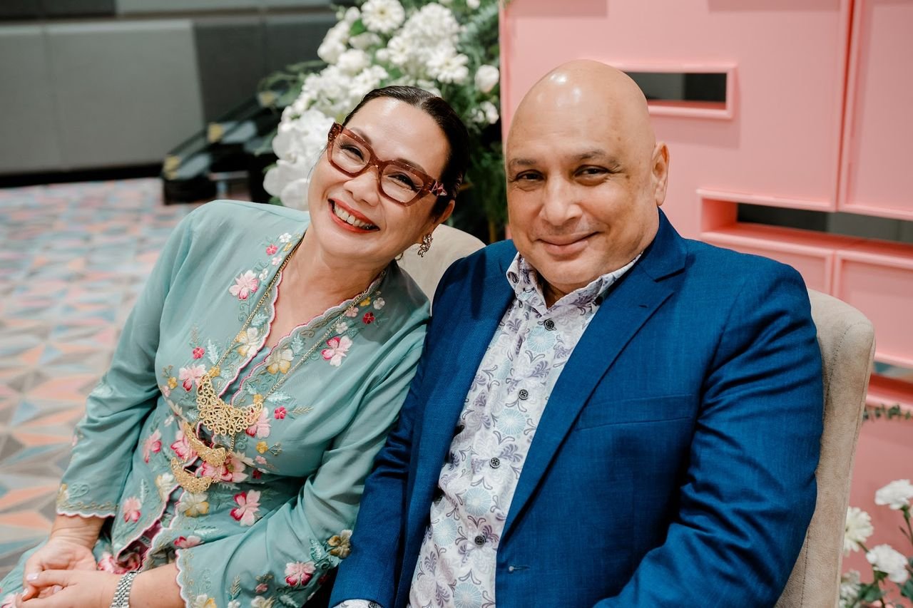 Smiling Parents of the Couple